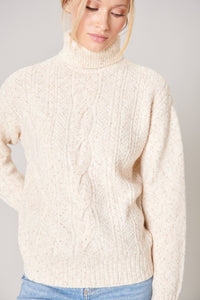 Wonderland Cable Knit Turtleneck Sweater