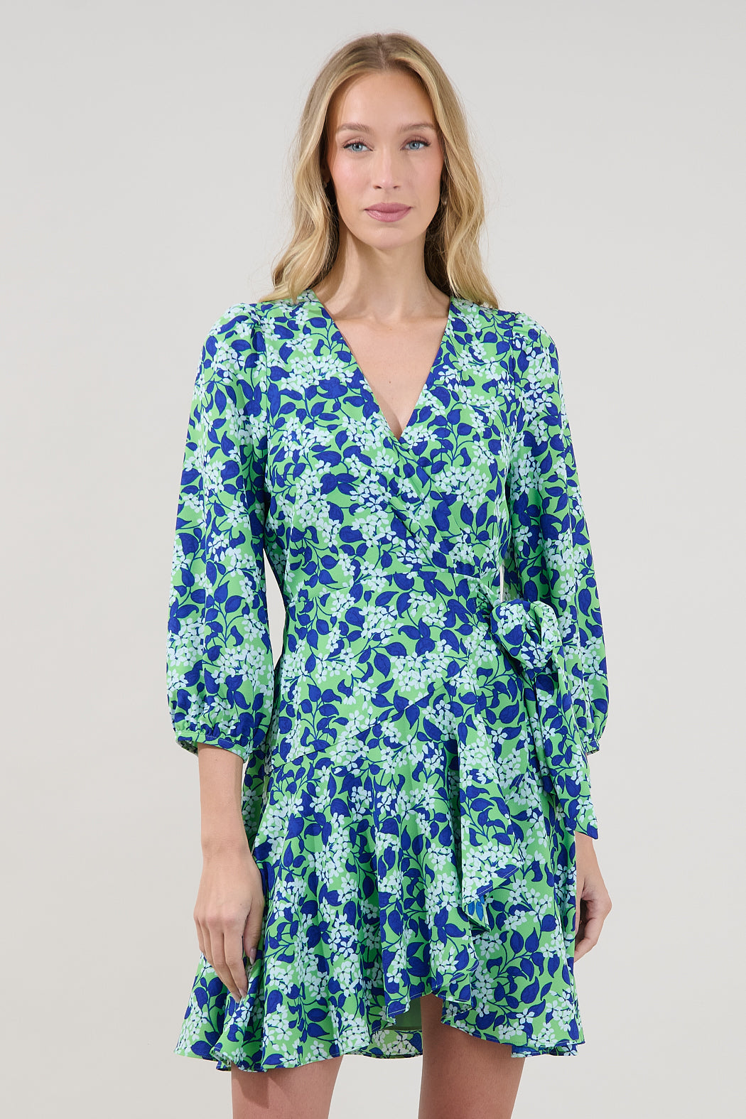 Berta Wrap Ruffle Mini Dress Floral GREEN-BLUES / S by Sugarlips